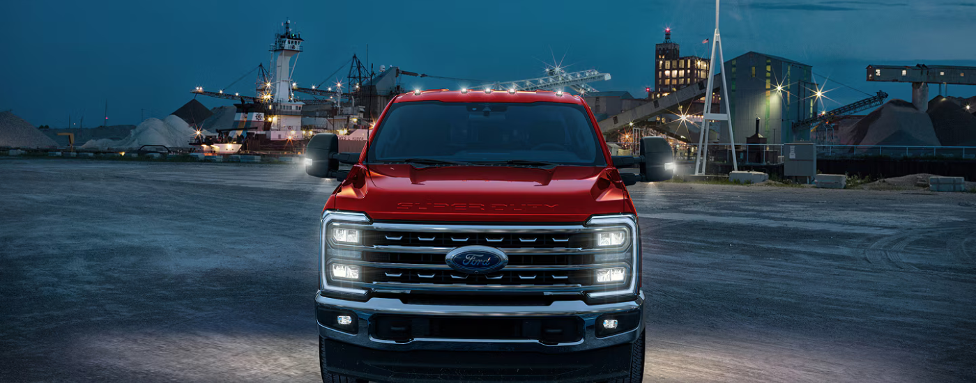 Red 2026 Ford F-450 parked head on in a snowy lot